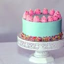 pink and white floral cake